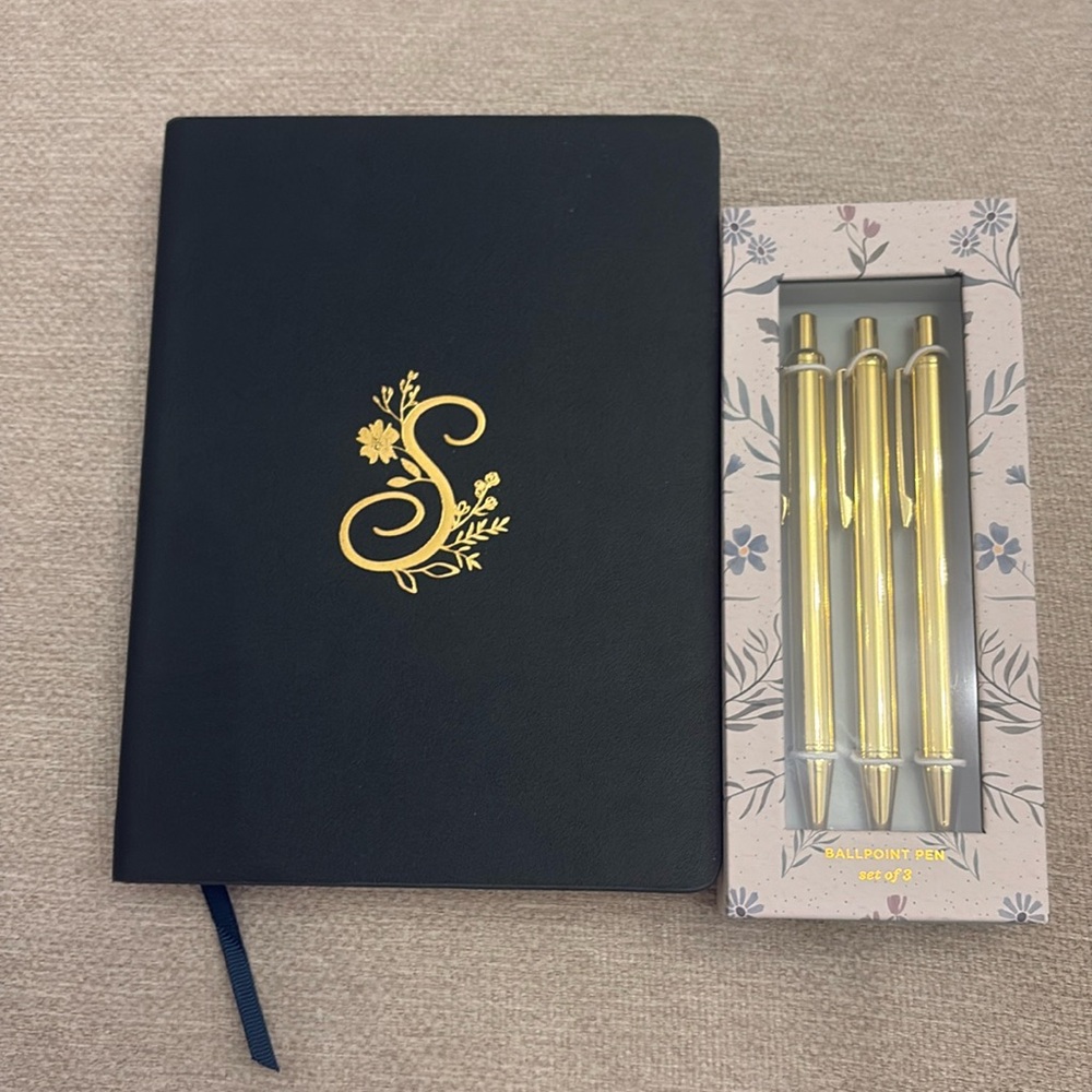 Monogrammed notebook and pack of pens